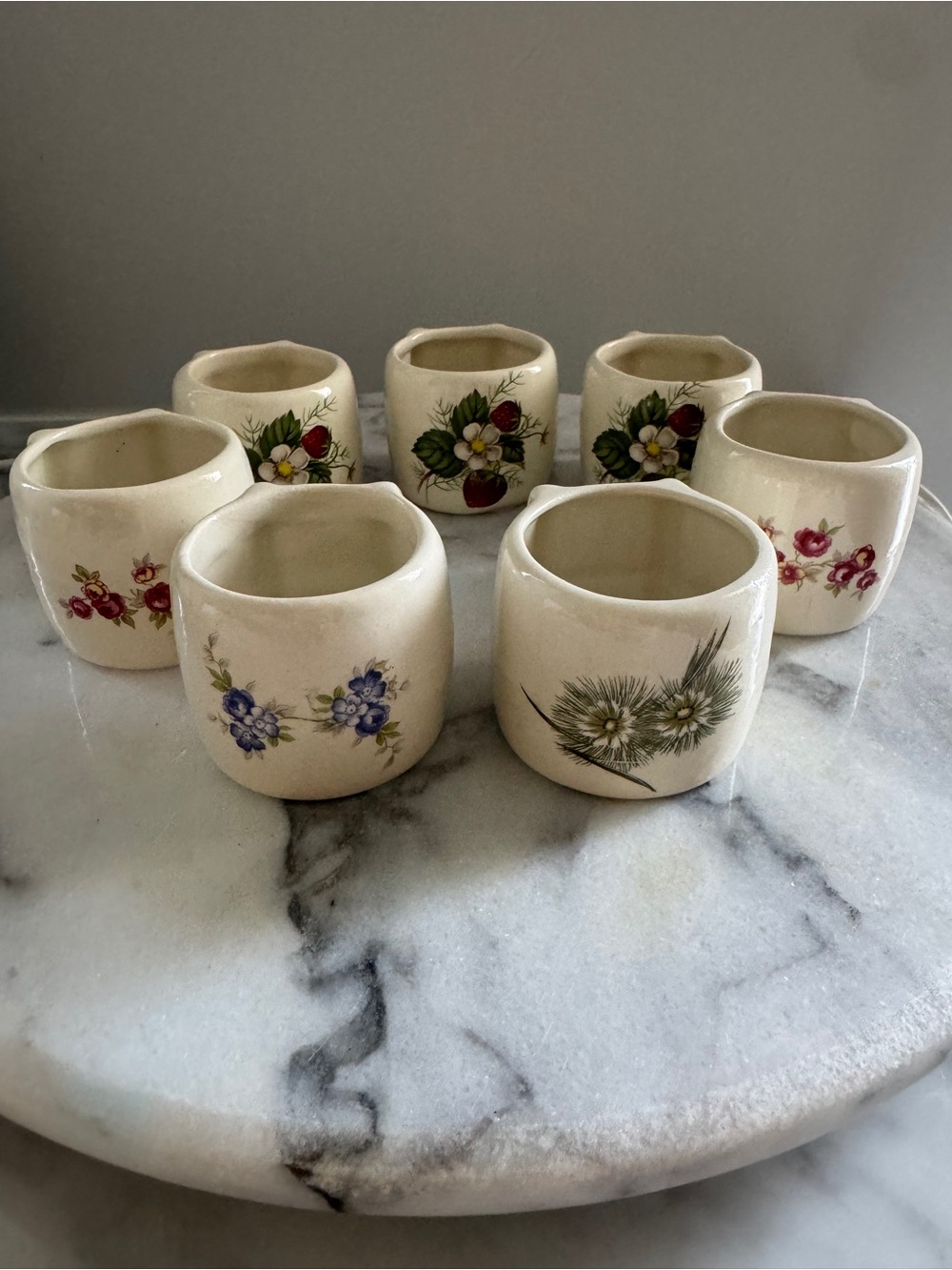 Vintage ceramic botanical/floral napkin rings- set of 7